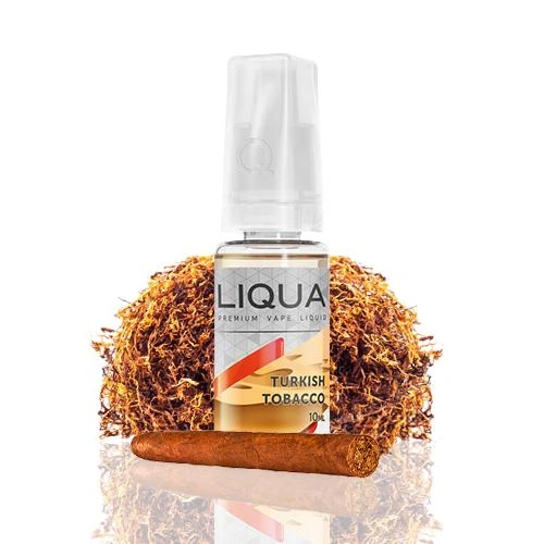 Frasco de líquido de vapeo Liqua Turkish Tobacco con tapa translúcida, ante un montón de tabaco y un cigarro en primer plano.