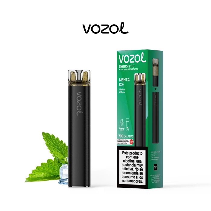 Vozol Switch Pro negro con boquilla transparente junto a su caja verde Menta Ice de 20 mg, con hojas de menta y hielo al lado.