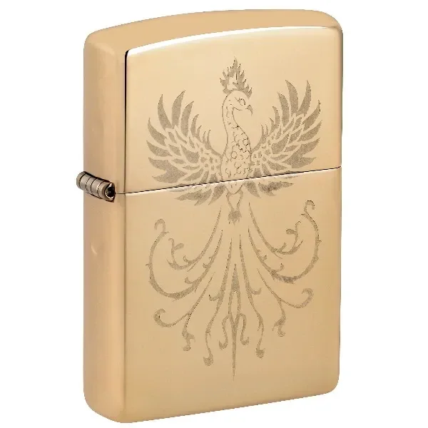 Encendedor Zippo 254B Phoenix Design cerrado, de acabado dorado, con un ave fénix grabada de alas abiertas y larga cola ornamental.