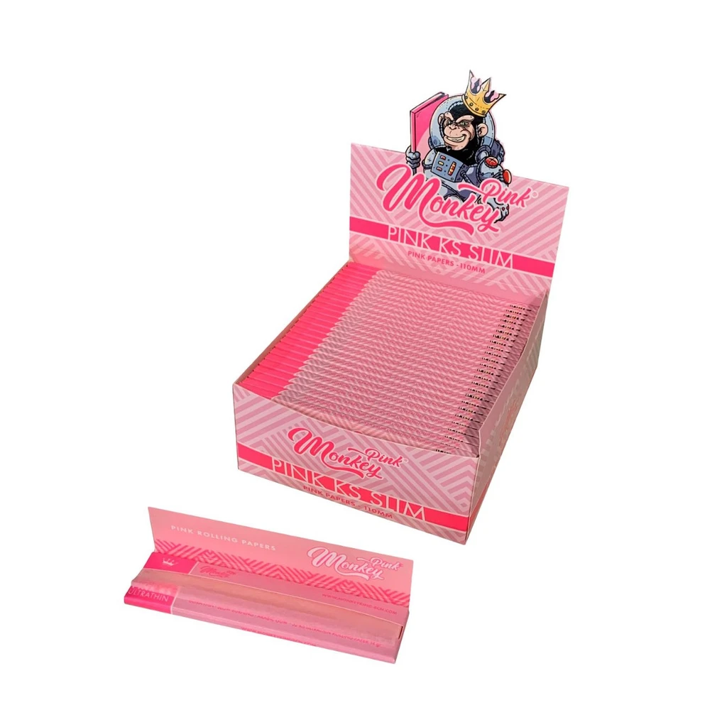 Expositor rosa de papel de fumar Pink KS Slim de Monkey King, con un mono coronado en la cabecera y un librito abierto delante.