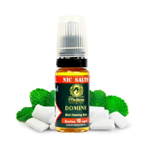 Frasco de Medievo Salts Domine con tapón translúcido y etiqueta Mint Chewing Gum, rodeado de hojas de menta y piezas blancas de chicle.