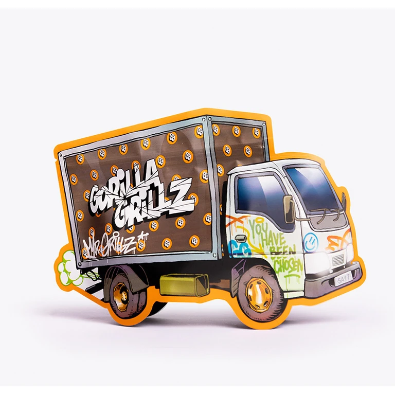 Envase con silueta de camión, borde naranja, grafitis y logotipo Gorilla Grillz en el lateral, sobre fondo blanco.