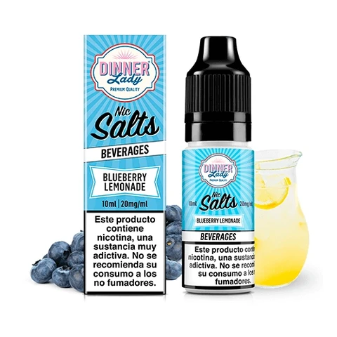 Frasco y caja azul de Dinner Lady Blueberry Lemonade Nic Salt, con aviso sobre nicotina, junto a arándanos y una jarra con limón.