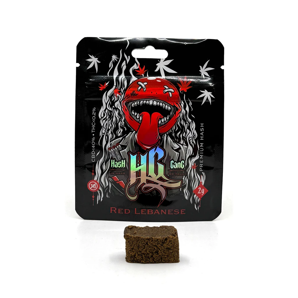 Bolsa negra Hash Gang Red Lebanese con personaje rojo de lengua larga y un bloque marrón delante sobre fondo blanco.