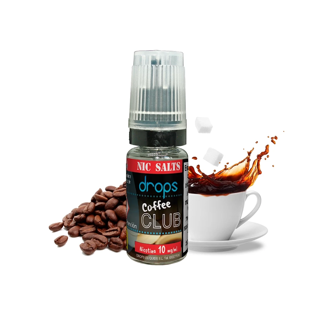 Frasco de Drops Salts Coffee Club con tapón transparente, junto a granos de café y una taza con una salpicadura de café.