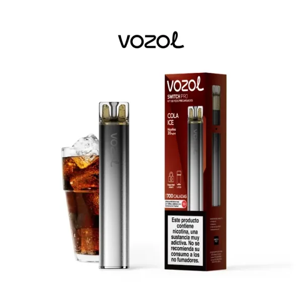 Vozol Switch Pro Cola Ice con dispositivo gris, caja roja con advertencia sobre nicotina y un vaso de refresco con hielo al fondo.