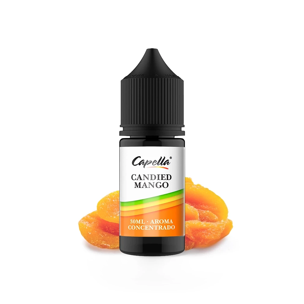 Frasco Capella Candied Mango de 30 ml con tapón negro y etiqueta blanca y naranja, delante de trozos de mango confitado.