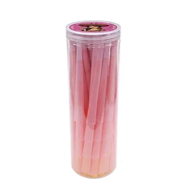 Conos King Size Rose de color rosa en un bote cilíndrico transparente con tapa y etiqueta circular rosa.