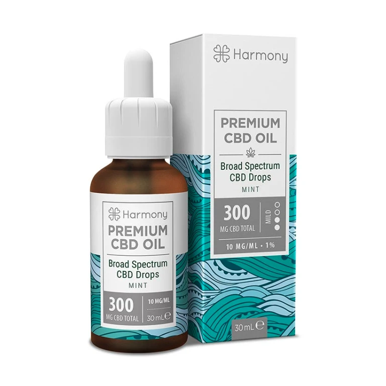 Frasco ámbar Harmony Premium CBD Oil Mint con cuentagotas blanco y caja de ondas turquesas, etiquetados con 300 mg y 30 ml.