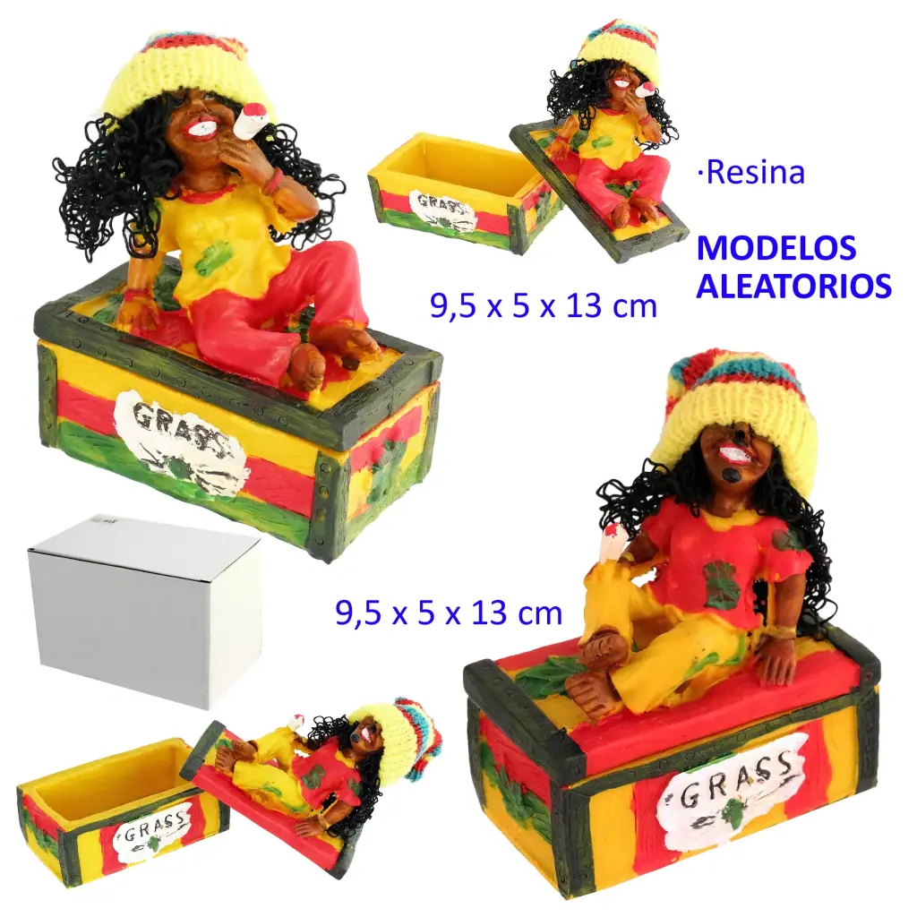 Selección de modelos de cenicero de resina con figura rasta sobre caja Grass en rojo, amarillo y verde, mostrados abiertos y cerrados.