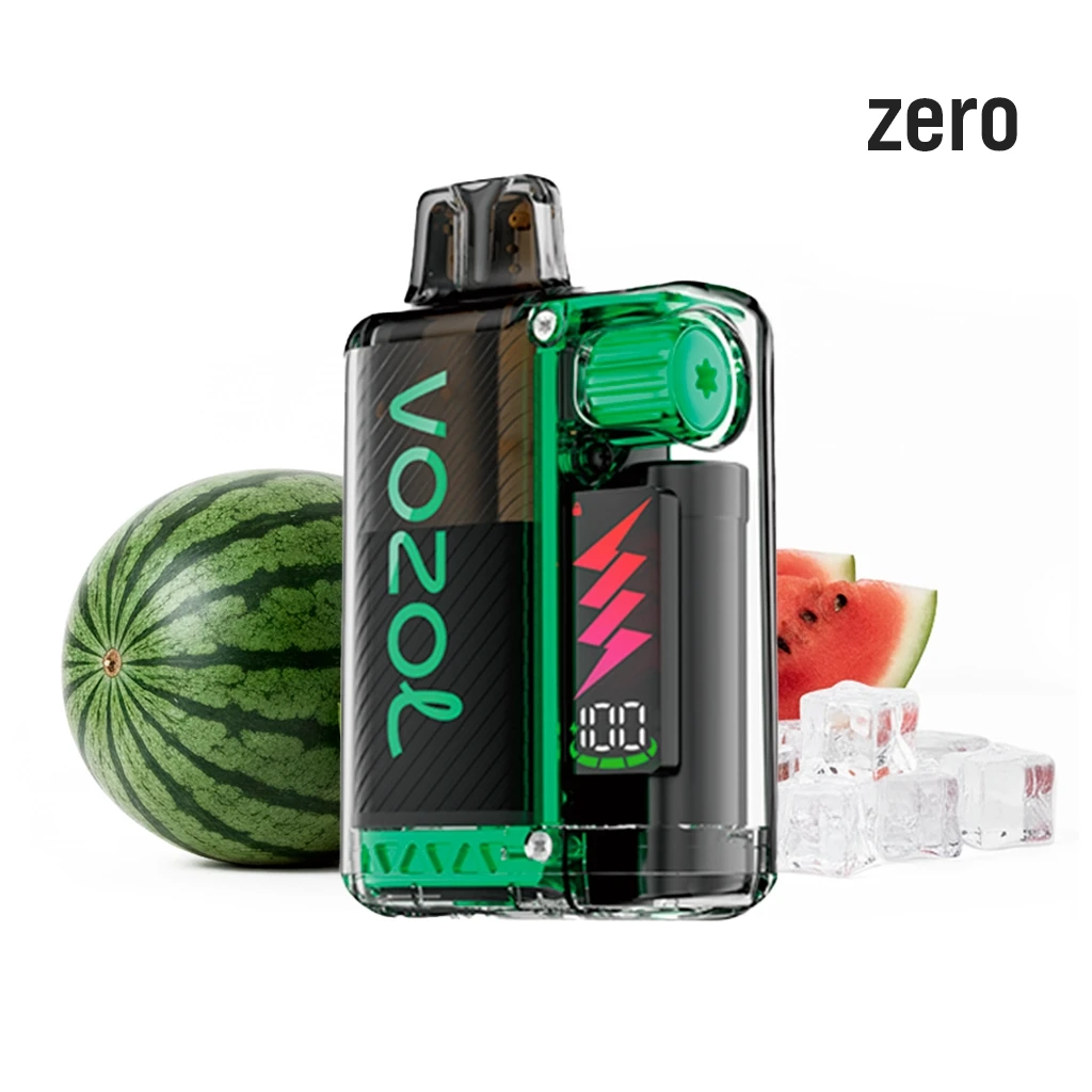 Vozol Vista Plug Watermelon Ice Zero verde y negro, con pantalla frontal, junto a sandía y cubitos de hielo sobre fondo blanco. Vozol Vista Plug Watermelon Ice Zero verde y negro, con pantalla frontal, junto a sandía y cubitos de hielo sobre fondo blanco.