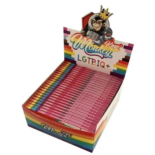Expositor de papel Monkey King Size Slim LGTBI con libritos rosas, franjas arcoíris y un mono coronado en la cabecera.