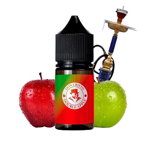Frasco Don Cristo Double Apple con tapón negro y etiqueta roja y verde, entre una manzana roja y otra verde, con una cachimba detrás.