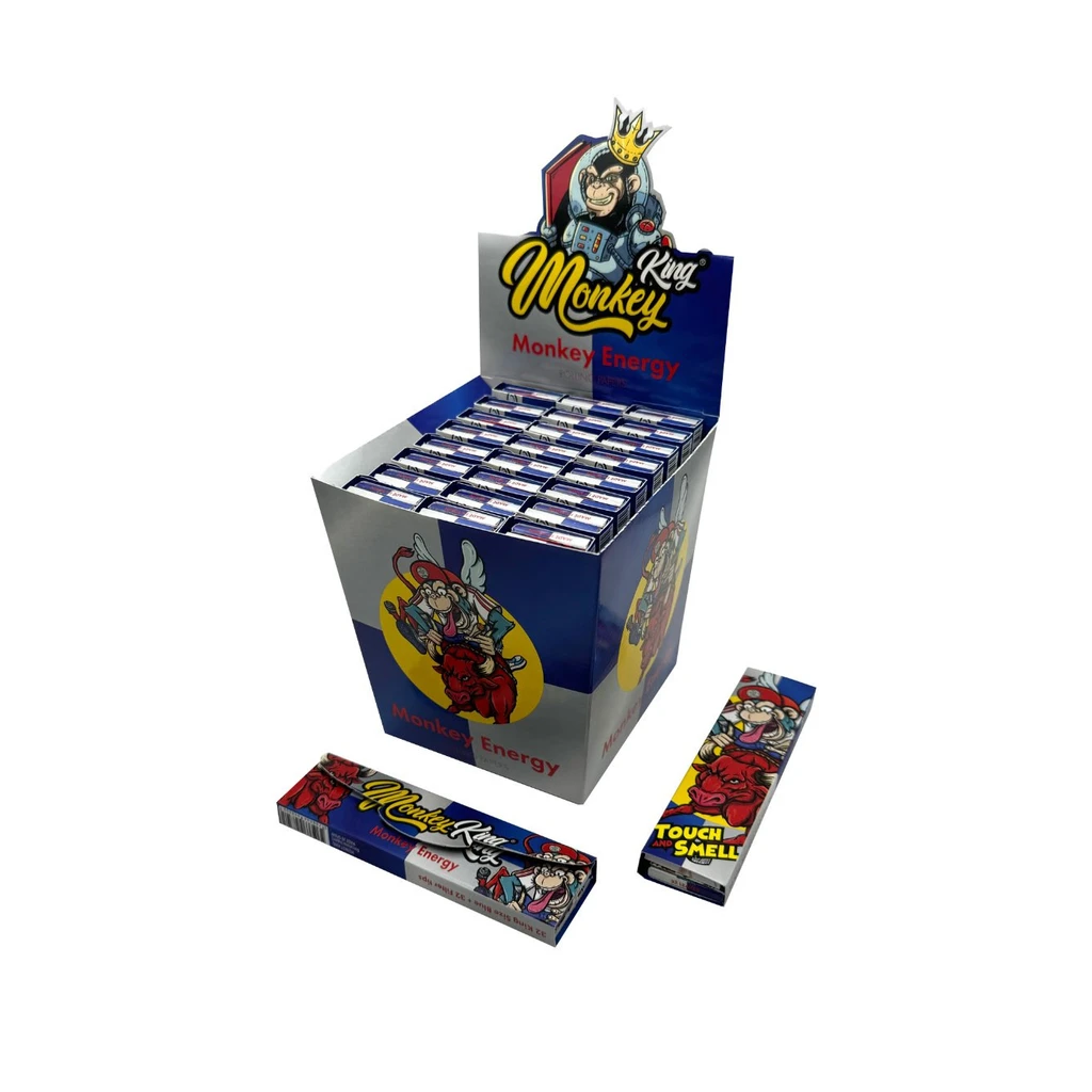 Expositor de papel Monkey King Monkey Energy con varias unidades y estuches delante, decorados con monos y dibujos de colores.