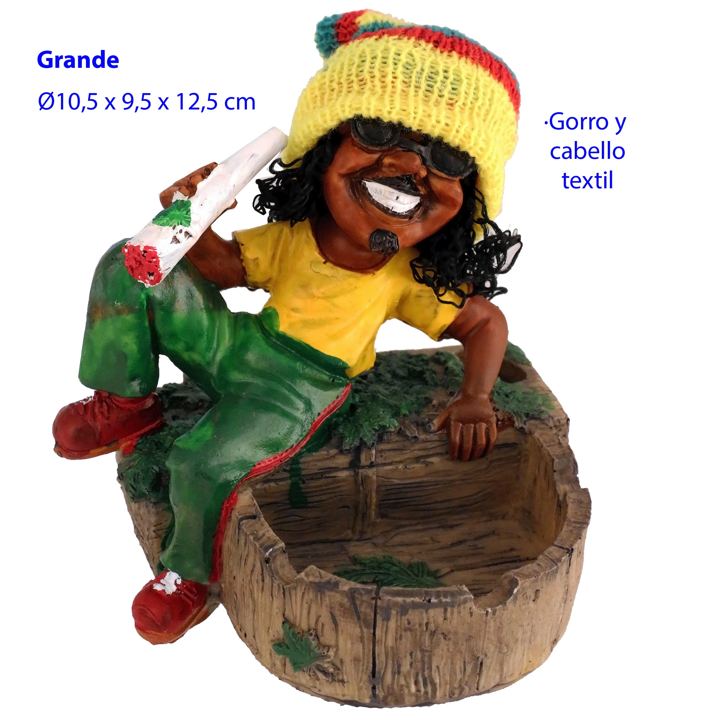 Cenicero de mesa Rasta con recipiente en forma de tronco y figura sonriente con gafas oscuras, gorro amarillo y pantalón verde con franja roja.