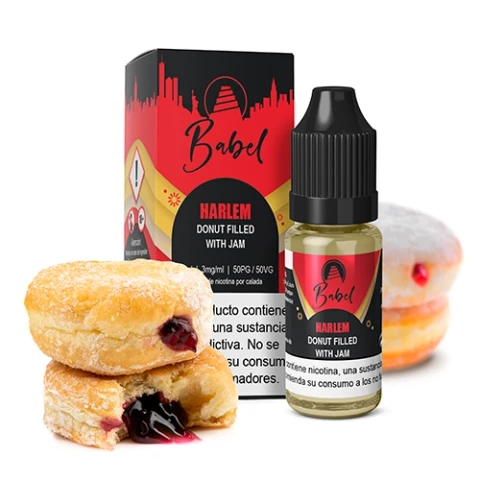 Frasco de Babel Harlem con tapón negro y caja roja y negra, junto a dónuts azucarados con relleno de mermelada visible.