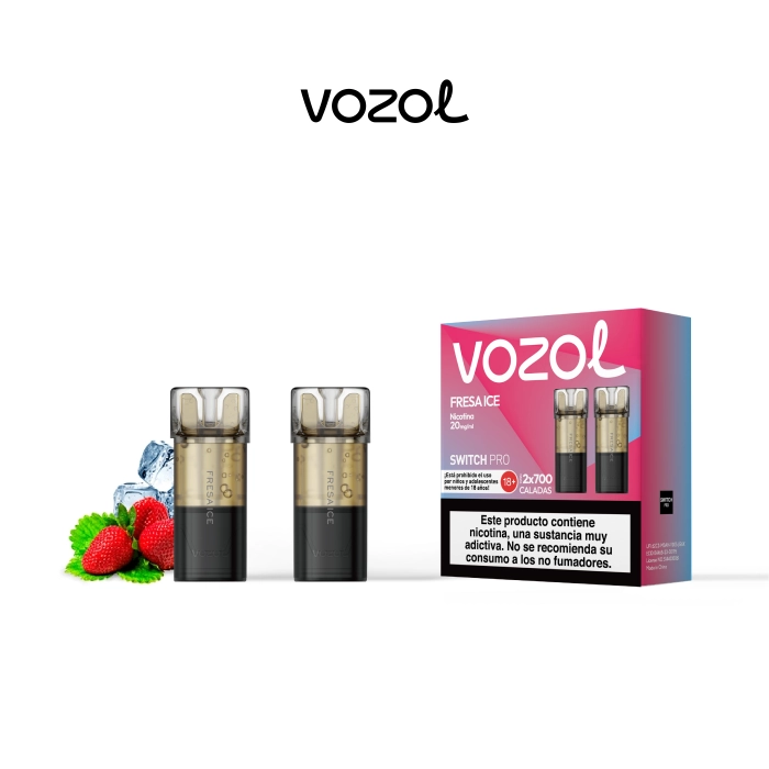 Pods Vozol Switch Pro Fresa Ice con boquilla transparente y base negra, junto a su caja rosa, fresas y hielo. Pods Vozol Switch Pro Fresa Ice con boquilla transparente y base negra, junto a su caja rosa, fresas y hielo.