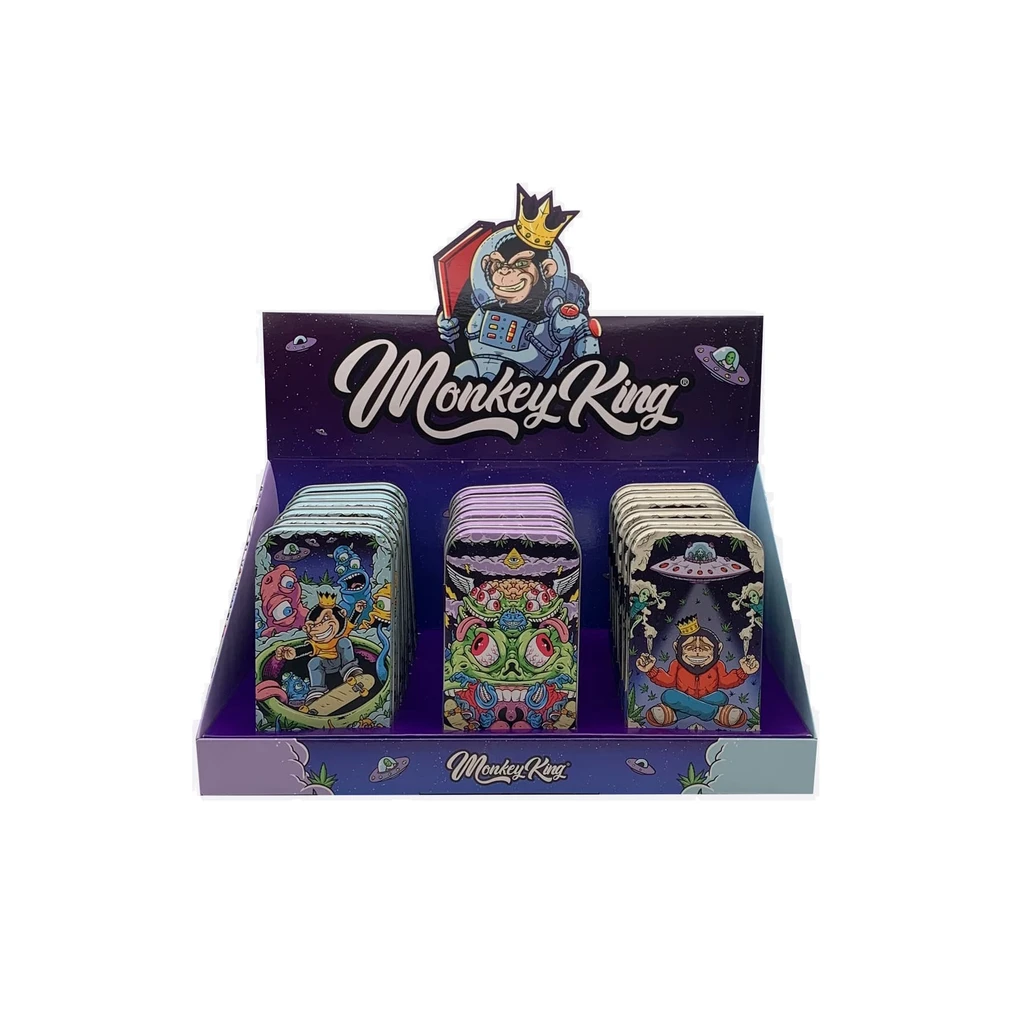 Expositor Monkey King con varias cajas metálicas rectangulares de distintos diseños espaciales, con monos, extraterrestres y ovnis.