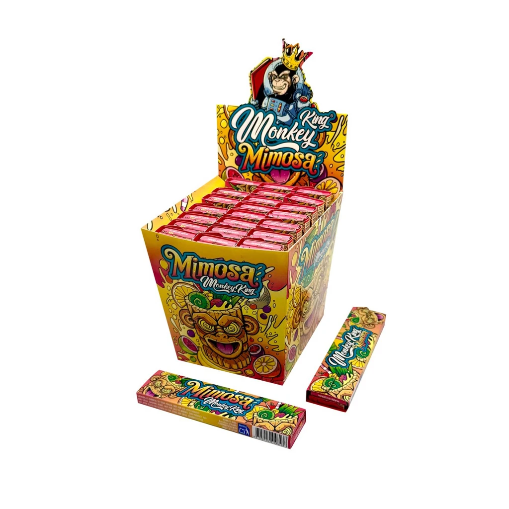 Expositor de papel Mimosa Monkey King con varios librillos y otros fuera de la caja, decorados con dibujos multicolores y un mono coronado.