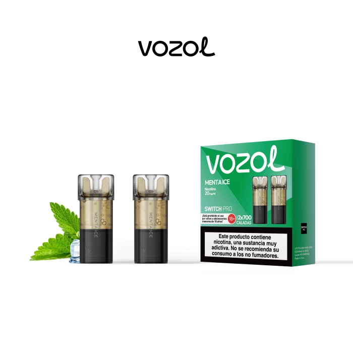 Pods Vozol Switch Pro Menta Ice junto a su caja verde con advertencia de nicotina, hojas de menta y cubitos de hielo. Pods Vozol Switch Pro Menta Ice junto a su caja verde con advertencia de nicotina, hojas de menta y cubitos de hielo.