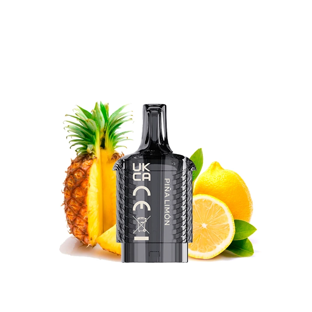 Pod Vista Plug Piña y Limón Vozol negro, con boquilla alargada y texto vertical, delante de una piña abierta y limones. Pod Vista Plug Piña y Limón Vozol negro, con boquilla alargada y texto vertical, delante de una piña abierta y limones.