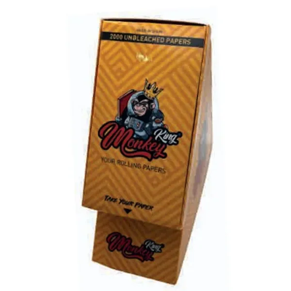 Dispensador Monkey King con diseño amarillo y naranja, un mono coronado y el texto «2000 Unbleached Papers» en la parte superior.