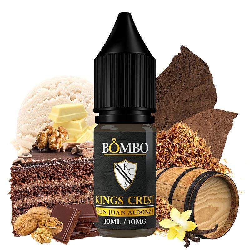 Frasco Don Juan Aldonza de Kings Crest y Bombo rodeado de tarta de chocolate, nueces, hojas de tabaco, vainilla y un barril.