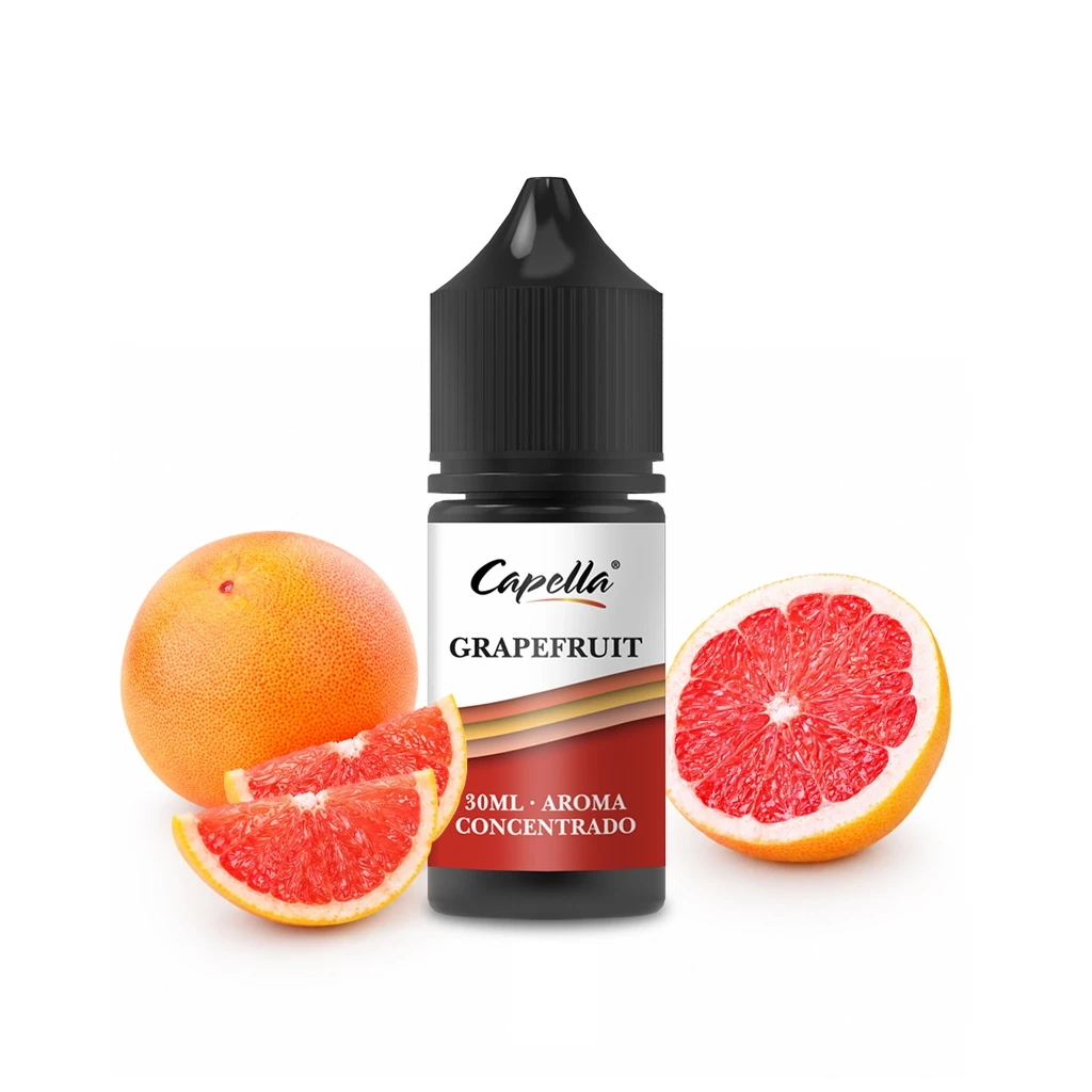 Frasco de aroma Capella Grapefruit con tapón negro y etiqueta de 30 ml, acompañado de un pomelo entero, medio pomelo y gajos.