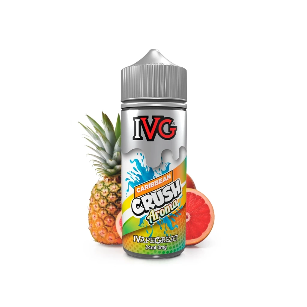 Botella IVG Caribbean Crush Aroma con tapón gris y etiqueta de 24 ml y 0 mg, presentada junto a una piña y un cítrico cortado.