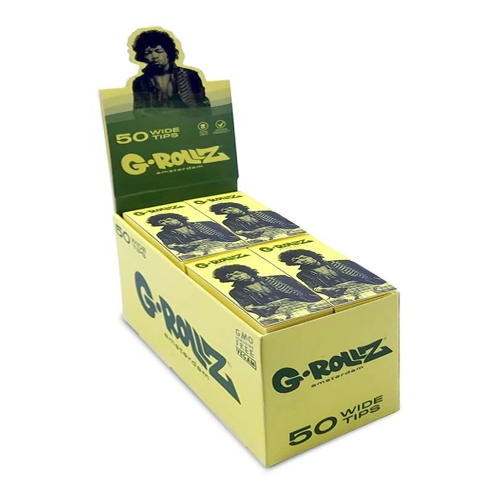 Expositor amarillo y verde de filtros G-Rollz Tips Purple Haze, con libritos ilustrados y el texto «50 Wide Tips».