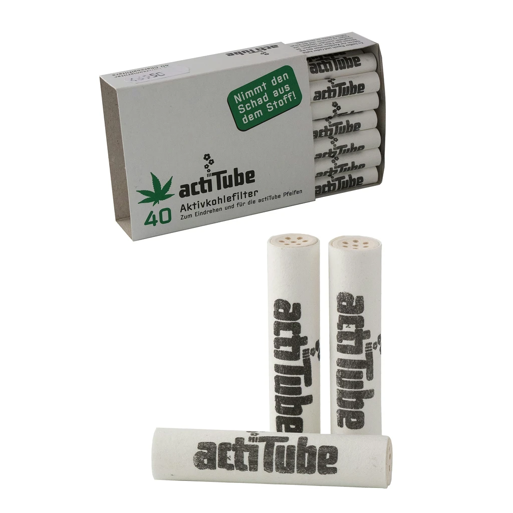 Caja abierta de filtros Actitube marcada con 40 y varios filtros cilíndricos blancos en primer plano, con logotipo negro y extremos perforados.