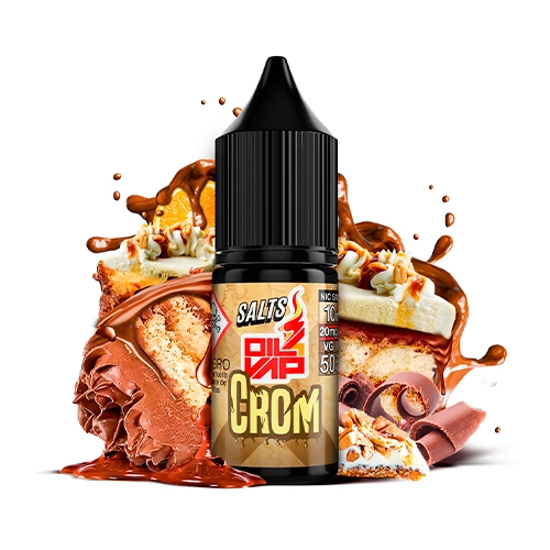 Frasco de Oil4Vap Crom Salts con tapón negro y etiqueta dorada, rodeado de porciones de tarta, virutas de chocolate y salpicaduras marrones.