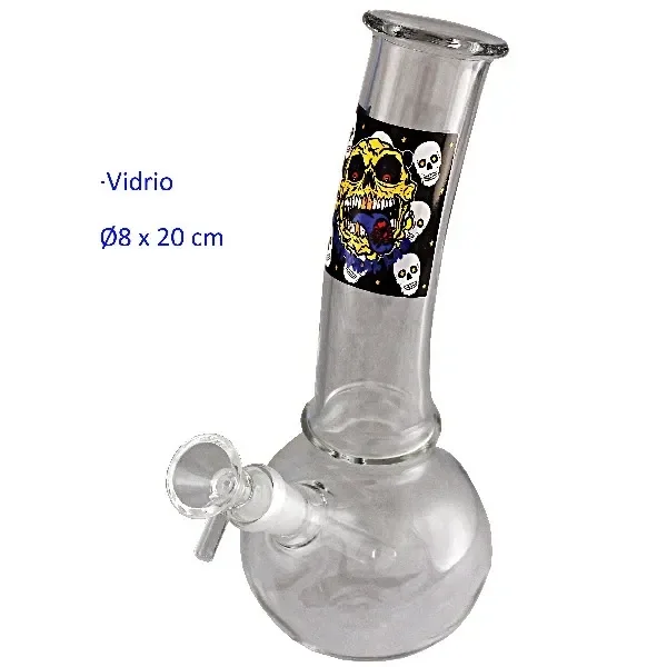 Bong de cristal transparente con base redondeada, cuello curvado, cazoleta lateral y dibujo de calavera amarilla rodeada de calaveras blancas.