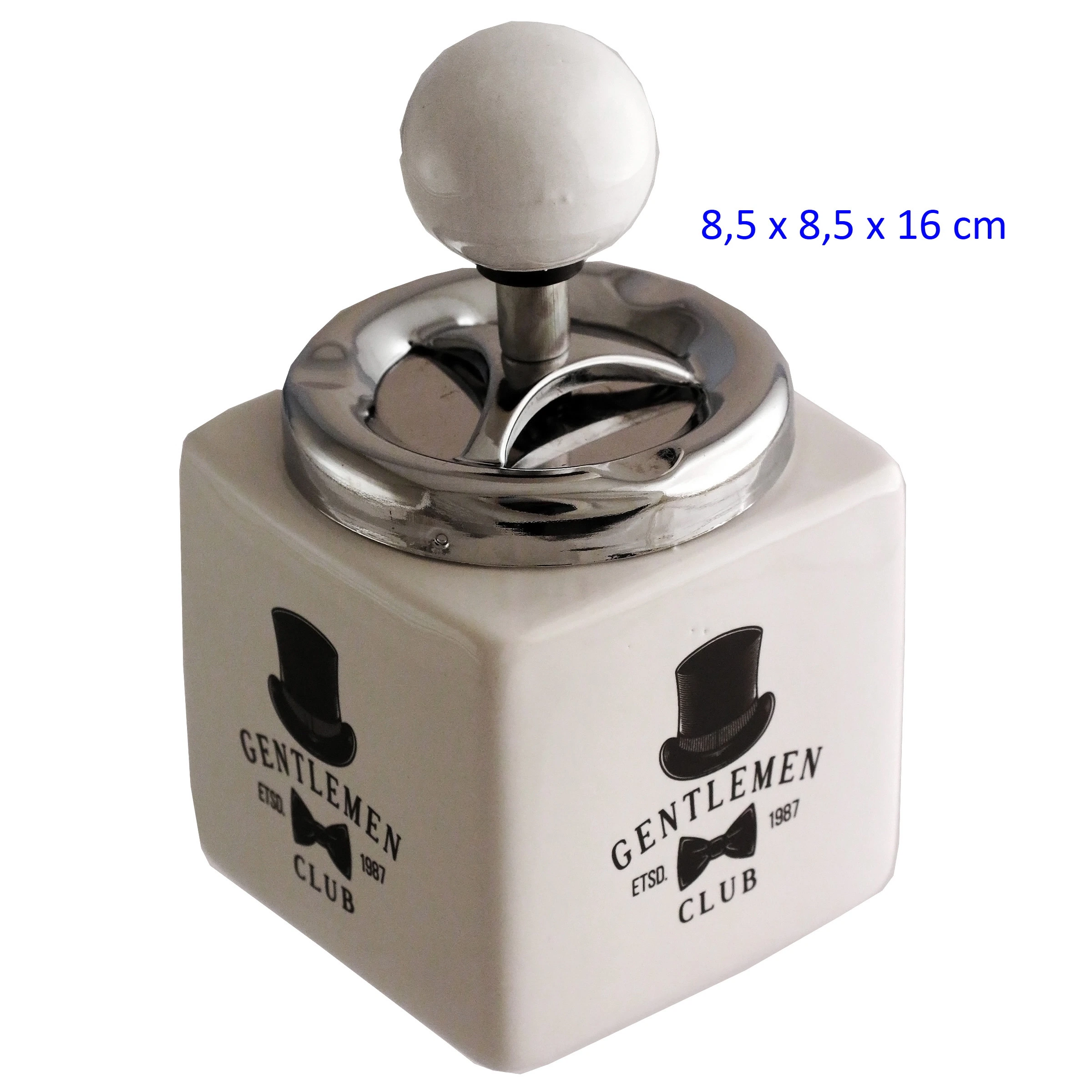 Cenicero de mesa Gentlemen Club, con base cuadrada blanca, dibujos de sombrero y pajarita, tapa metálica y pulsador esférico blanco.