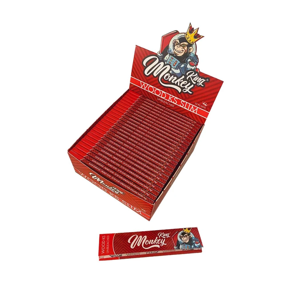 Expositor rojo abierto de papel Wood KS Slim Monkey King, con varios libritos y un mono coronado en la cabecera.