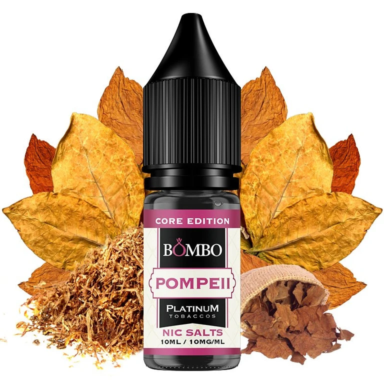 Frasco de Pompeii de Bombo Core Edition con tapón negro, etiqueta de 10 ml y 10 mg/ml, rodeado de hojas secas y tabaco picado.