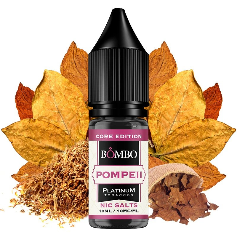 Frasco de Pompeii de Bombo Core Edition con tapón negro, etiqueta de 10 ml y 10 mg/ml, rodeado de hojas secas y tabaco picado.