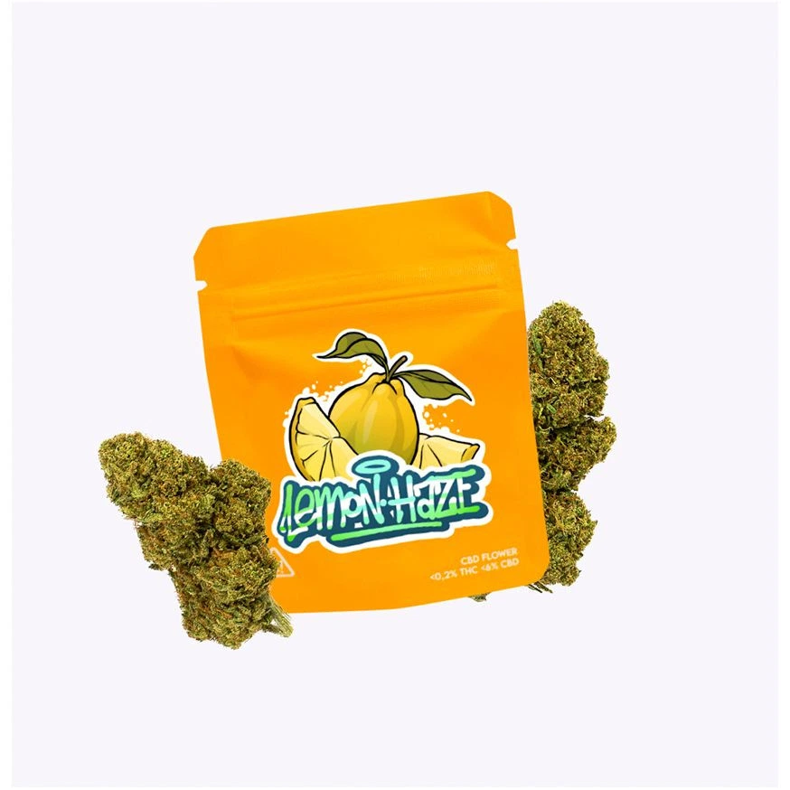 Bolsa naranja Lemon Haze con ilustración de un limón y cogollos verdes a ambos lados, sobre fondo claro.