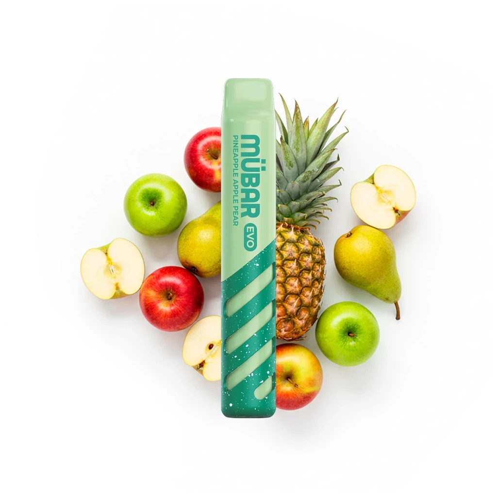 Vapeador Mübar Evo verde con franjas diagonales, rodeado de piña, manzanas rojas y verdes, peras y fruta cortada sobre fondo blanco.