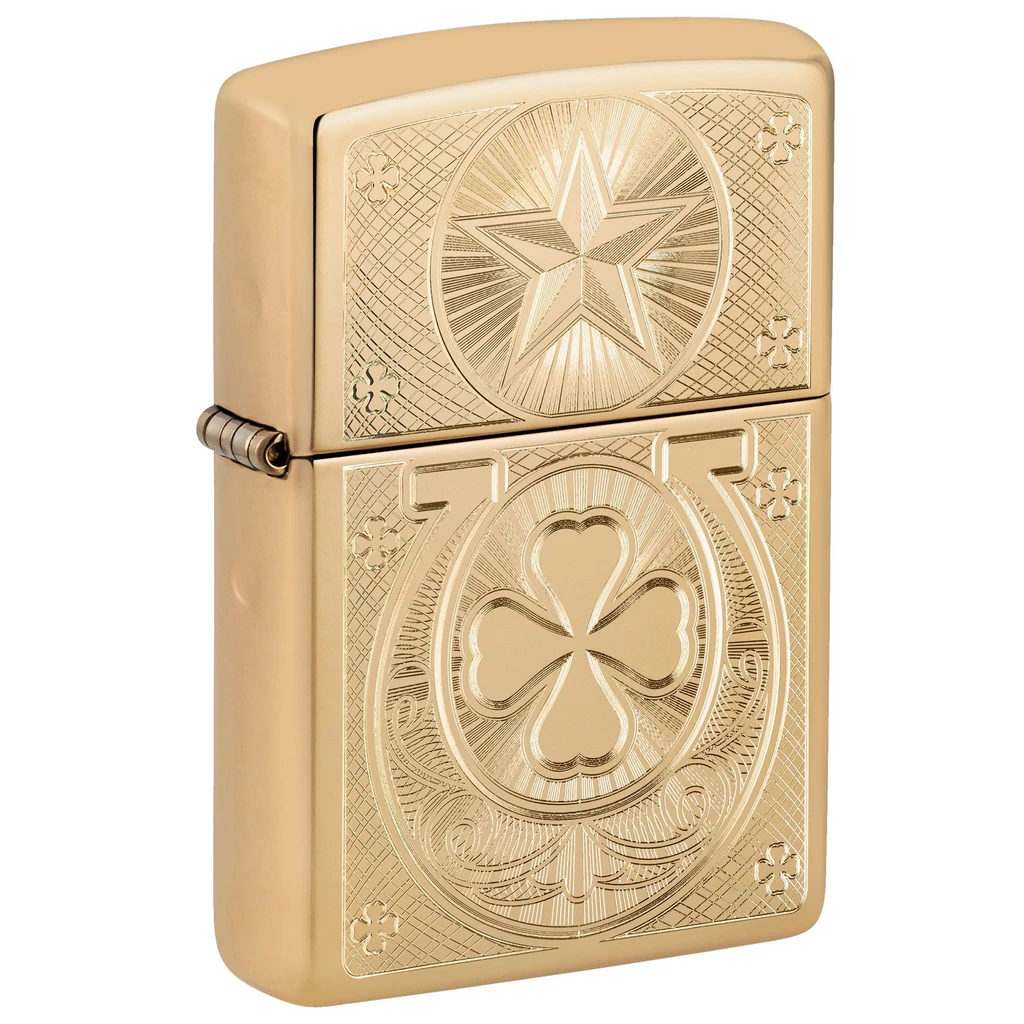 Encendedor Zippo 254B Luck Design dorado, cerrado y en perspectiva, con grabados de estrella, herradura y trébol.