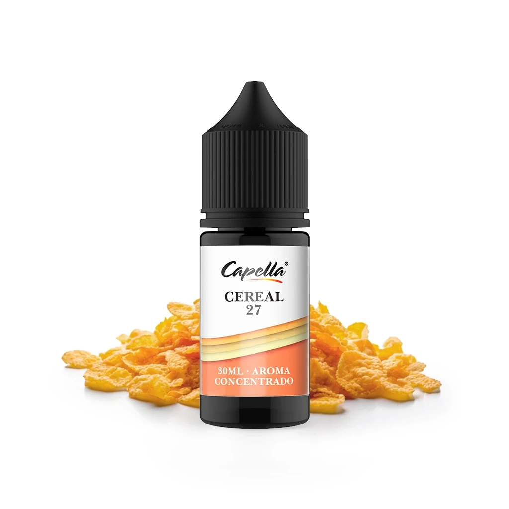 Frasco de aroma Capella Cereal 27 de 30 ml, con tapón negro y etiqueta blanca y naranja, delante de copos de cereales sobre fondo blanco.