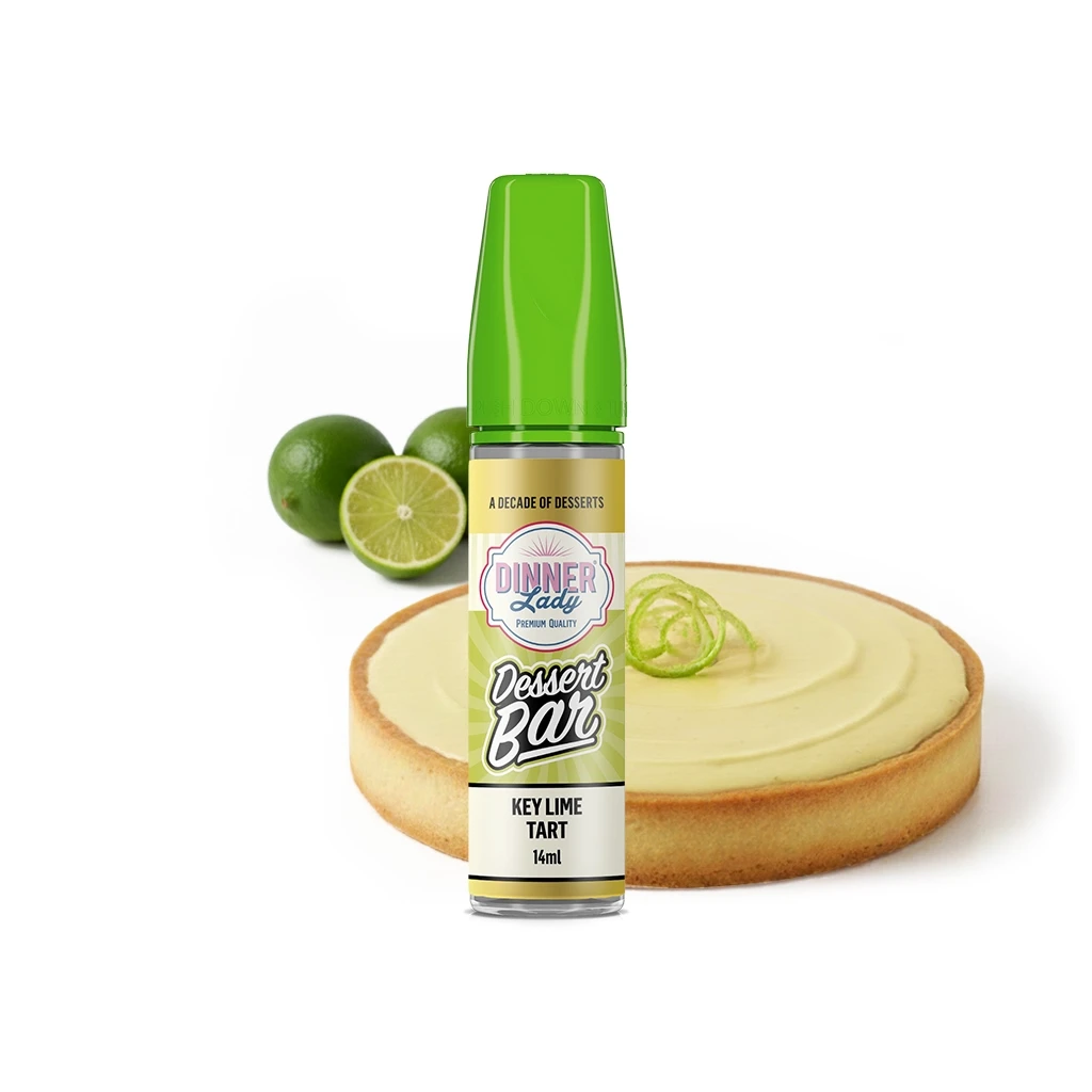 Frasco Dinner Lady Dessert Bar Key Lime Tart de 14 ml con tapón verde, delante de una tarta y limas enteras y cortadas.