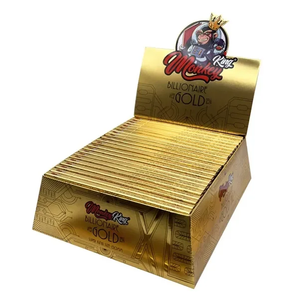 Expositor dorado abierto de papel de liar Billionaire Gold Monkey King, con varias libretas y un logotipo de mono coronado.