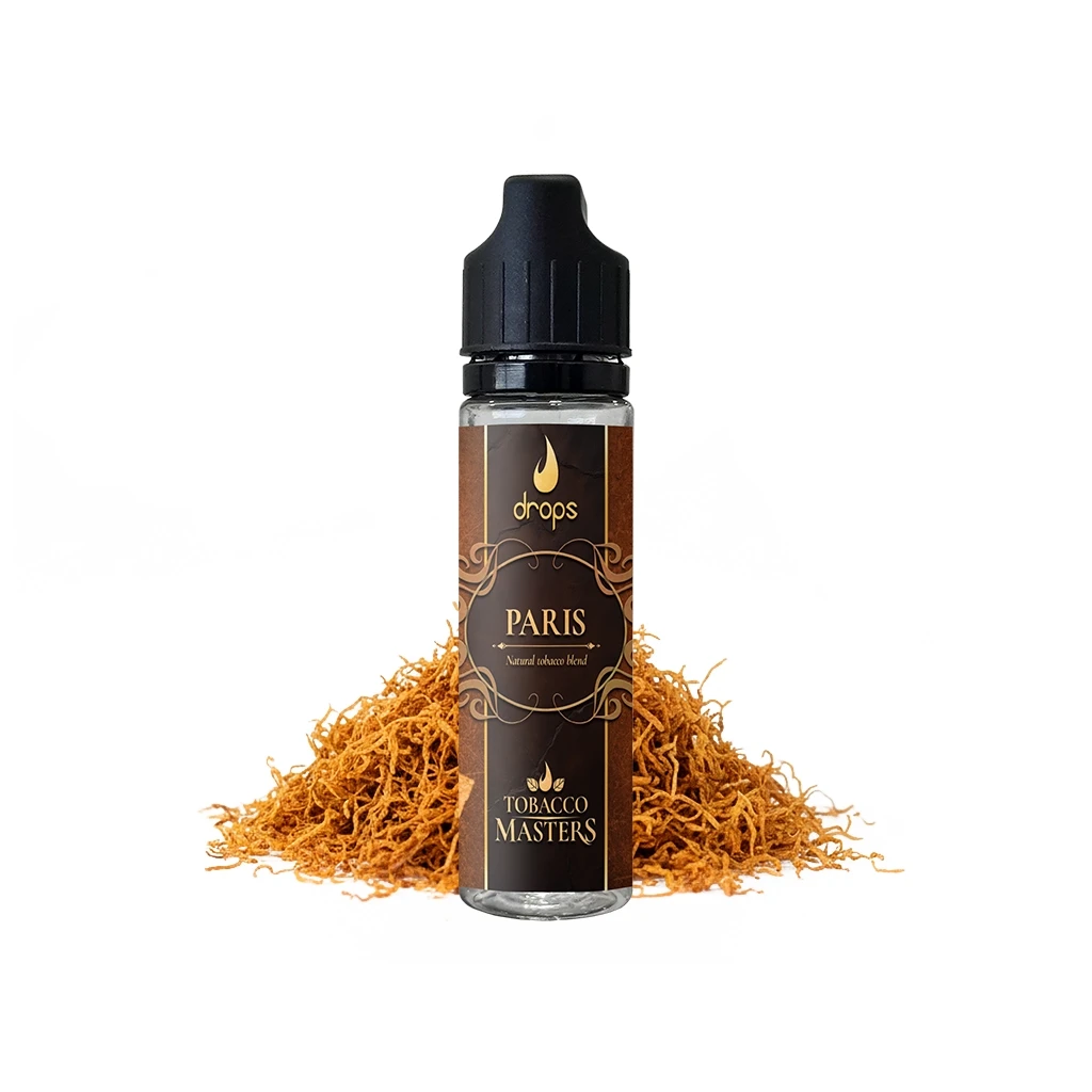 Frasco de Drops Tobacco Masters Paris con tapón negro y etiqueta marrón y dorada, delante de un montón de tabaco sobre fondo blanco.