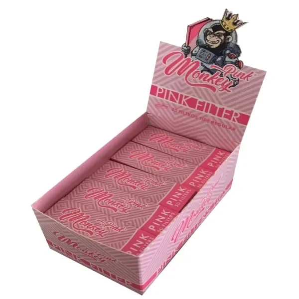 Expositor rosa de filtros Monkey King Pink con varios libritos estampados y una cabecera ilustrada con un mono coronado.