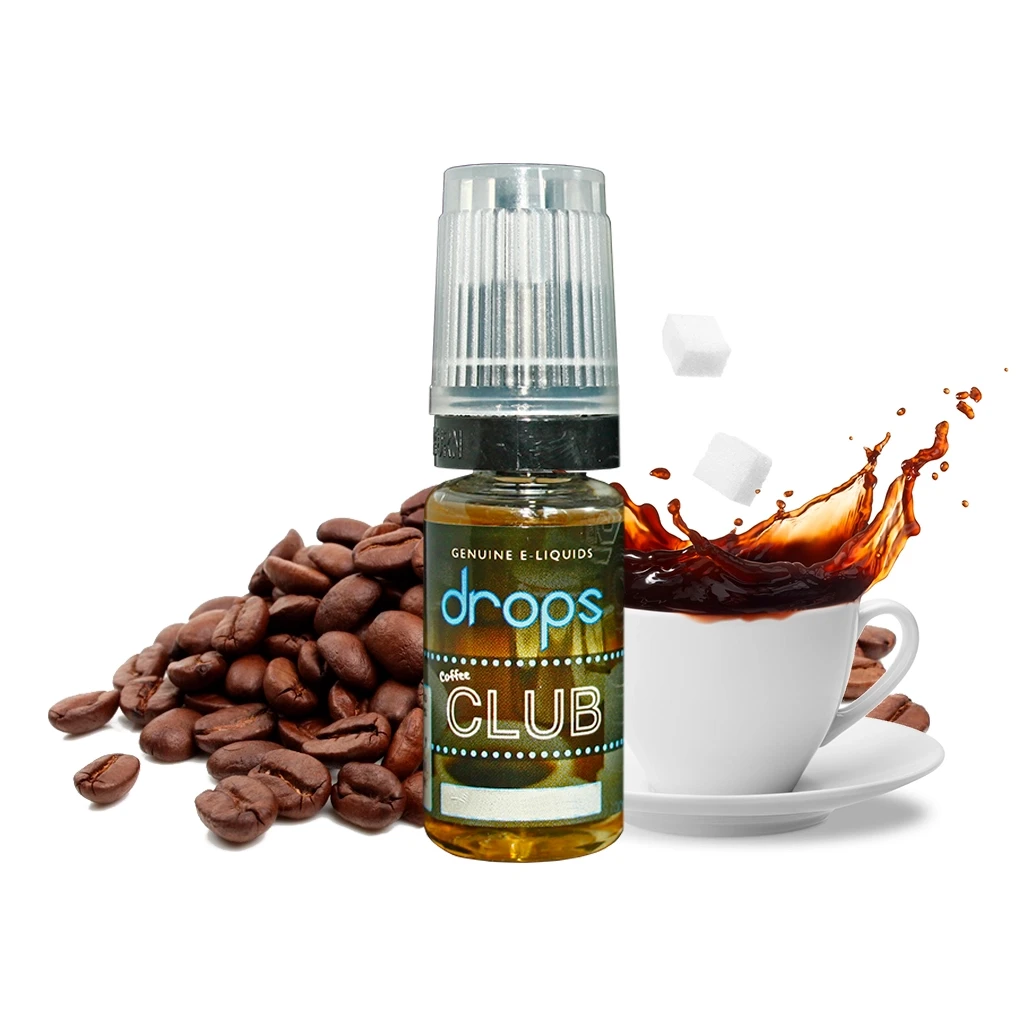 Frasco Drops Genesis Coffee Club con tapón translúcido, junto a granos de café, terrones de azúcar y una taza con una salpicadura de café.