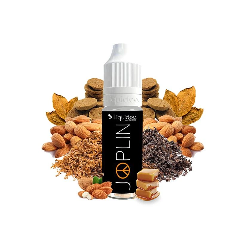 Frasco de e-líquido Joplin con etiqueta negra y tapón blanco, rodeado de almendras, hojas secas, tabaco picado y dados de caramelo.