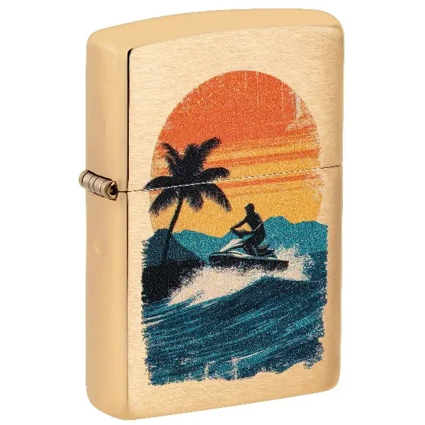 Encendedor Zippo 204B Jetski Design cerrado, de acabado dorado, con una moto acuática sobre olas, una palmera y un sol naranja.