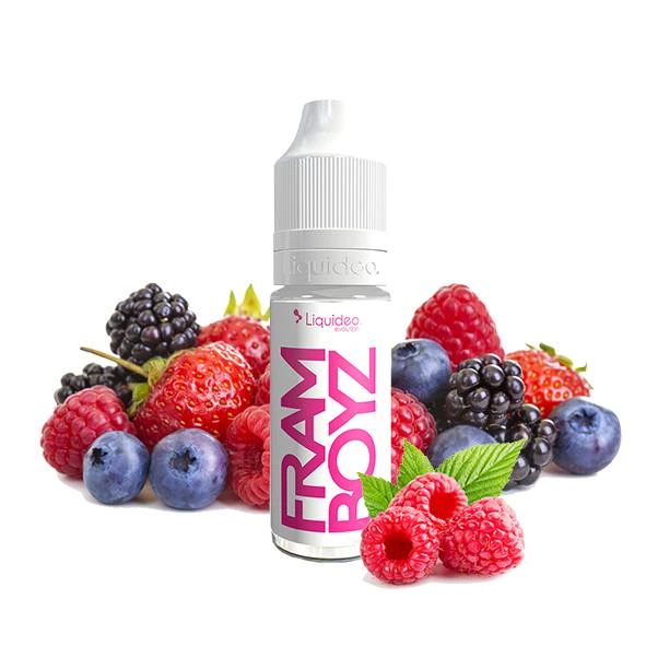 Frasco FRAMBOYZ de Liquideo con tapón blanco y letras rosas, rodeado de frambuesas, fresas, moras y arándanos.
