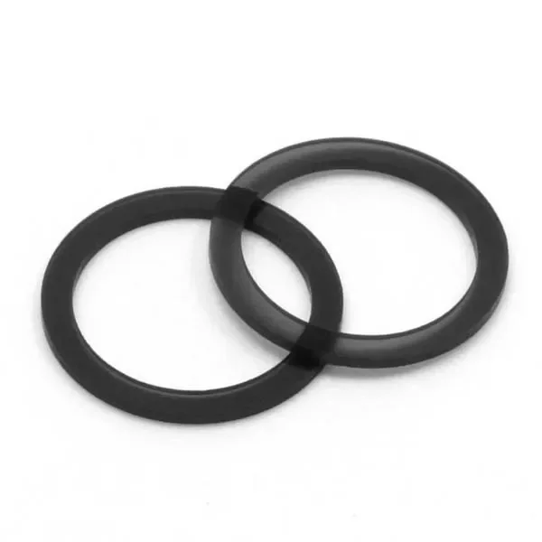 Arandelas negras para boquilla X-vape Ace, parcialmente superpuestas sobre fondo blanco, con forma circular y bordes gruesos.